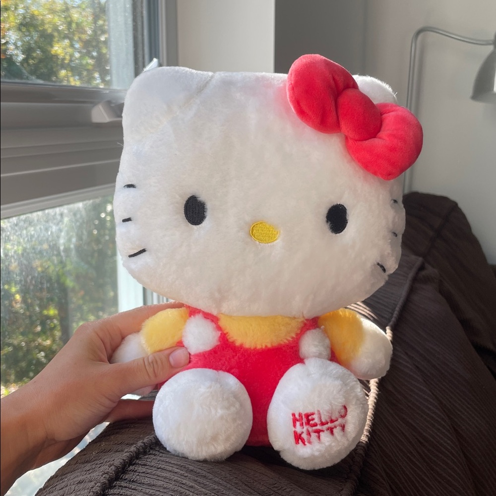 Hello Kitty plush with in red outfit